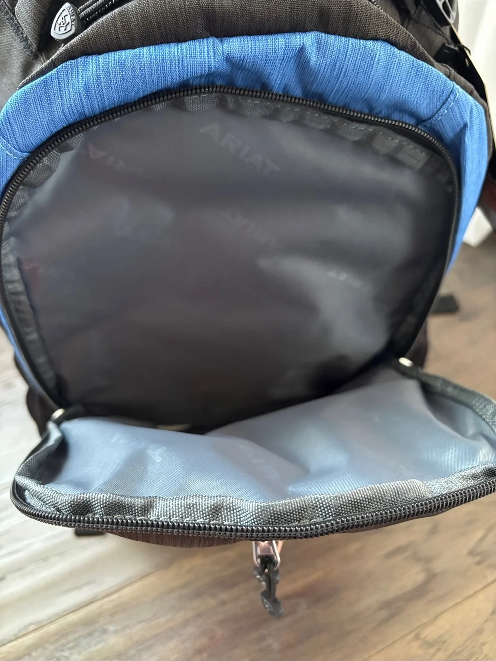 Ariat Logo Backpack,3 zipper compartments,organization slots,bottle holders